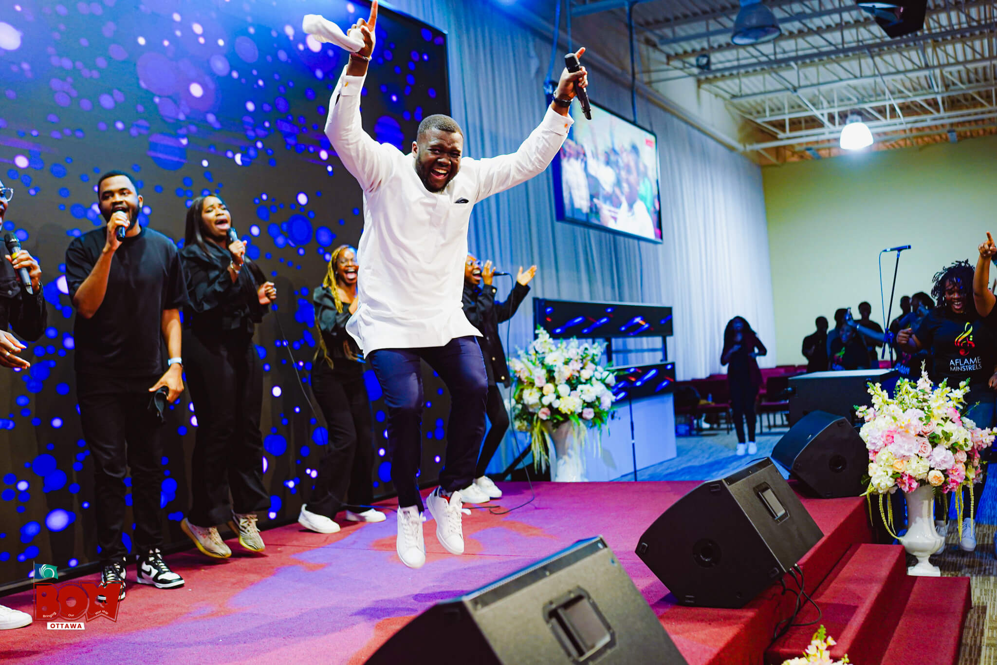 Worship leaders and musicians on stage at Bringing Our Worship in Ottawa