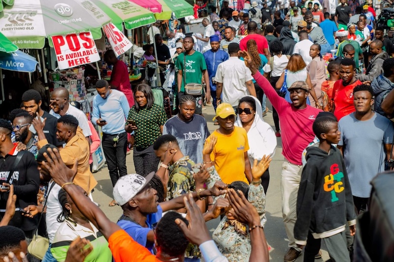 Volunteers and community members at a Favored Generation activity